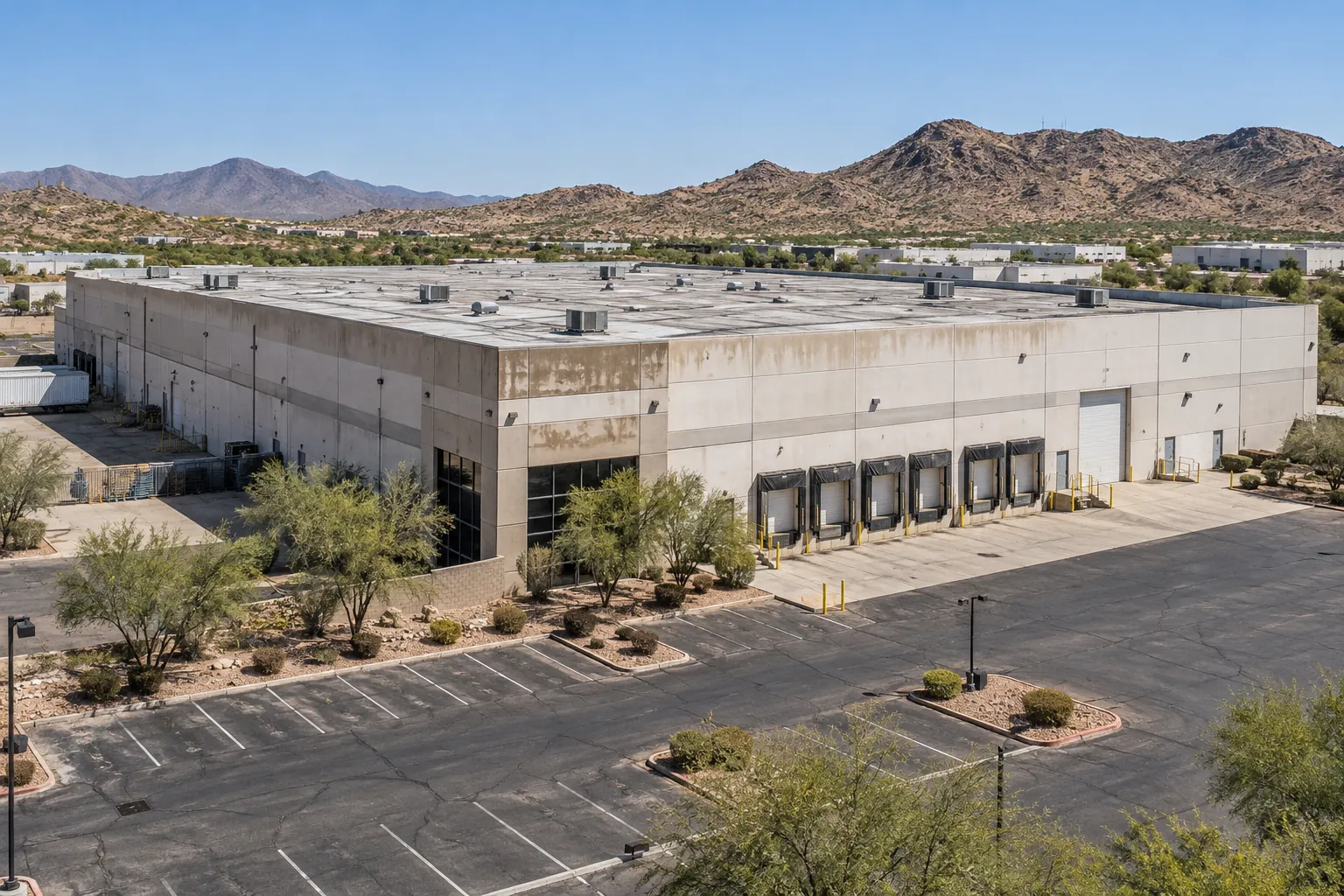 Concrete distribution building with truck docks and a flat roof in north Phoenix